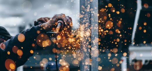 person holding tool during daytime